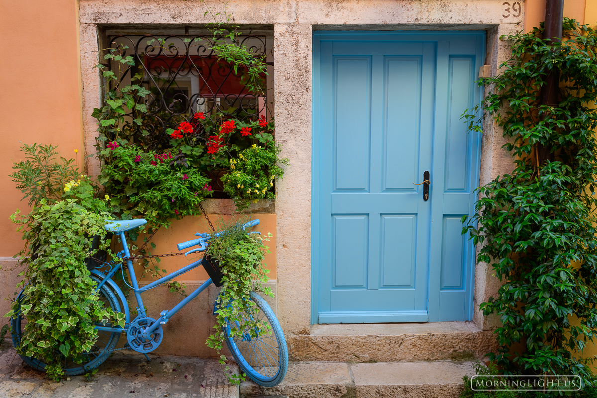 Someone in Rovijn, Croatia staged this beautiful scene outside their home along a narrow little cobblestone alley.