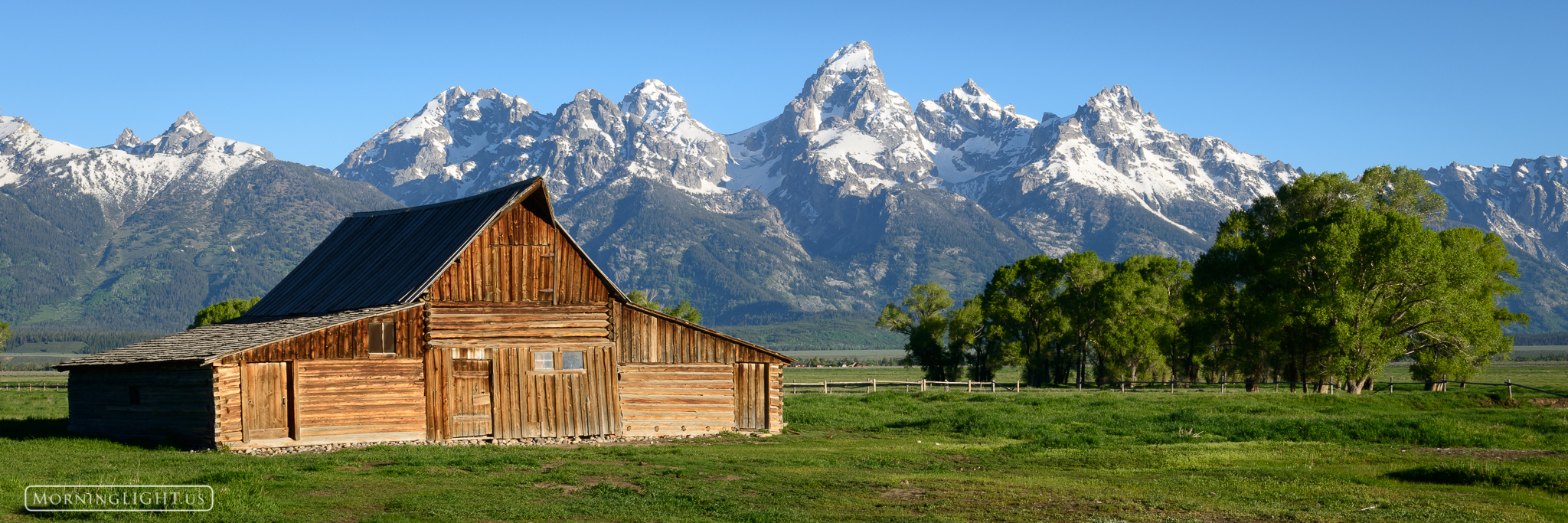 The idyllic barn at Grand Teton National Park during a gorgeous summer morning.
