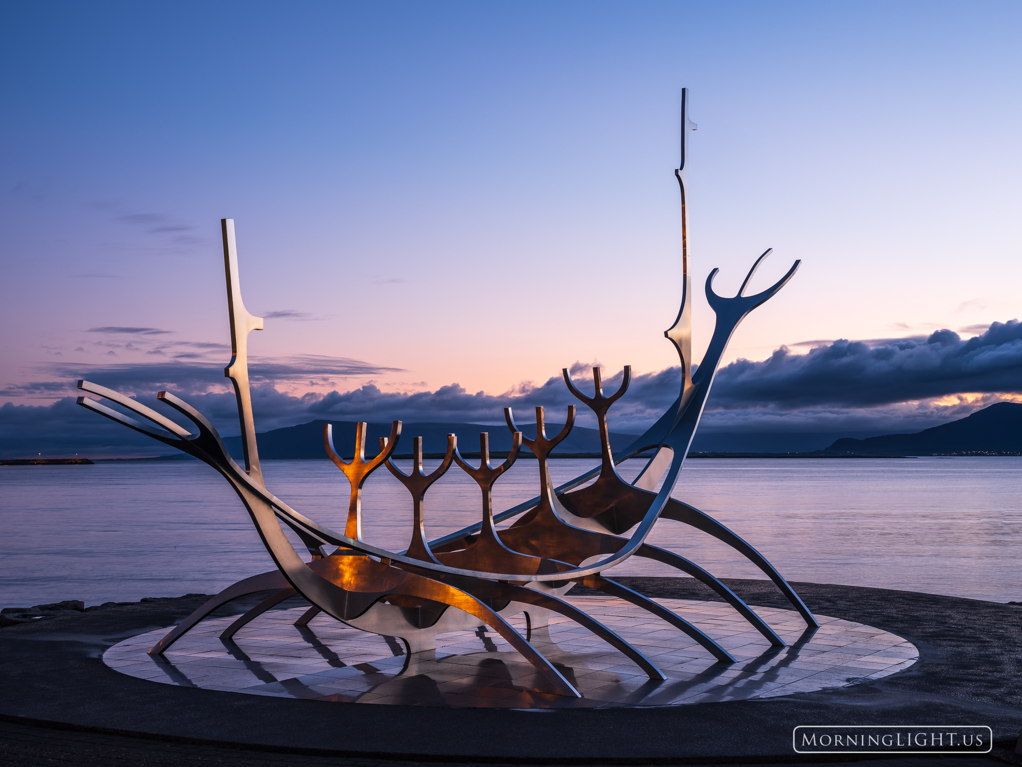 The Sun Voyager sculpture in Reykjavik, Iceland looks ready to sail in the predawn light of a new day.