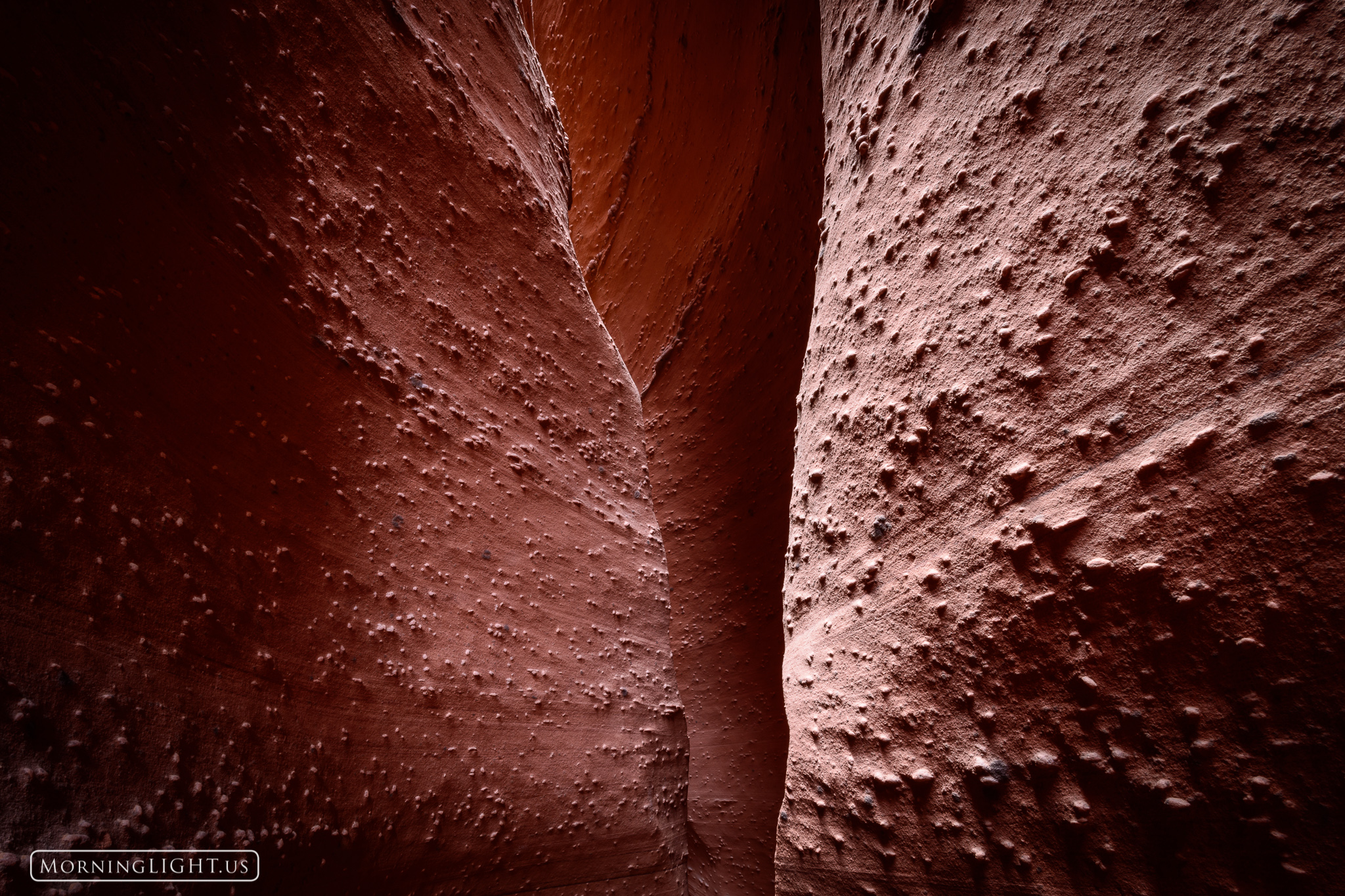 This is a very narrow slot canyon in central Utah. There is barely 12" between walls in many places such as this, making it difficult...