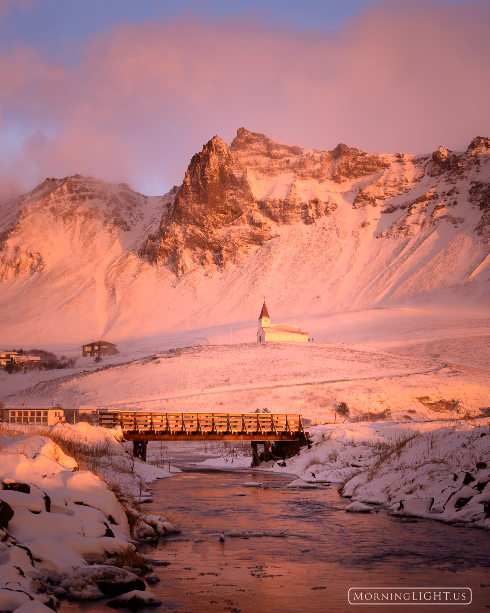The beautiful village of Vik, Iceland welcomes visitors with its snowy charm.